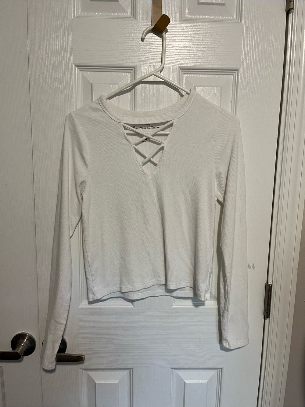 Women’s White Crisscross Long-Sleeve Top